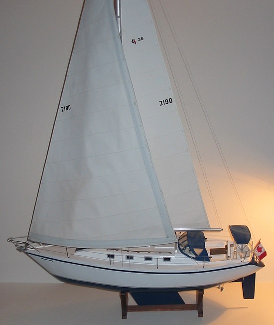 Image of model yacht - full sail