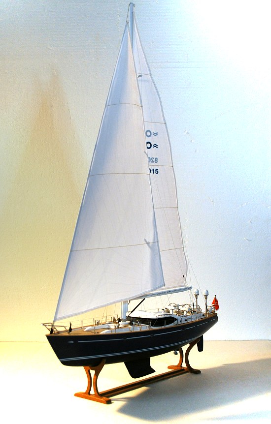 Image of sailboat with sails and mast